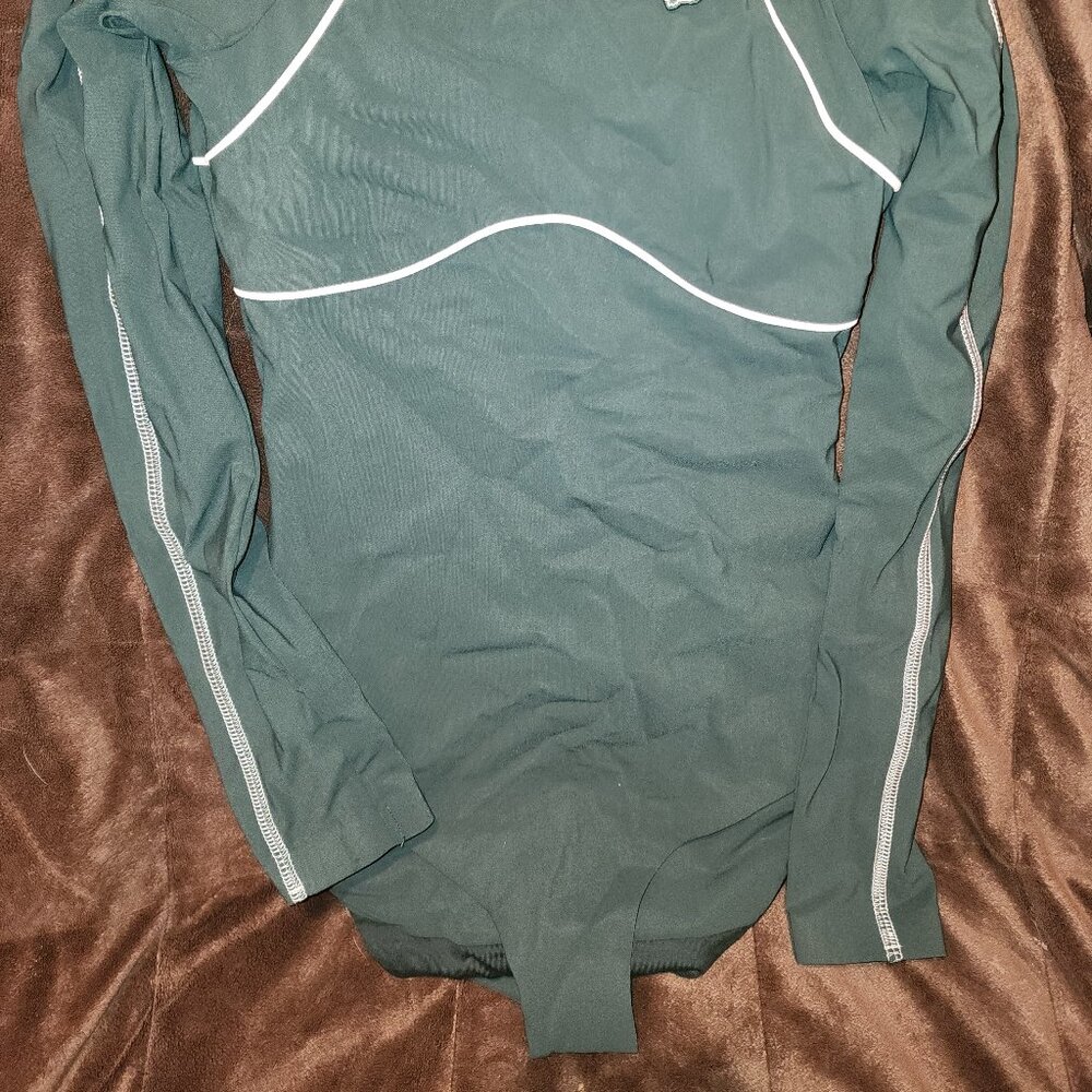 New one piece bodysuit by Lacoste